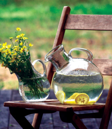 Small Mouthed Circular Tilted Pitcher